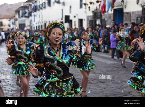 Revellers Wearing Traditional Costumes Dance During The Festival The