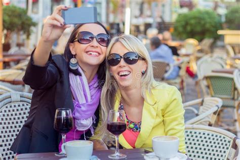 Two Cheerful Girls Taking Selfie Stock Image Image Of Natural