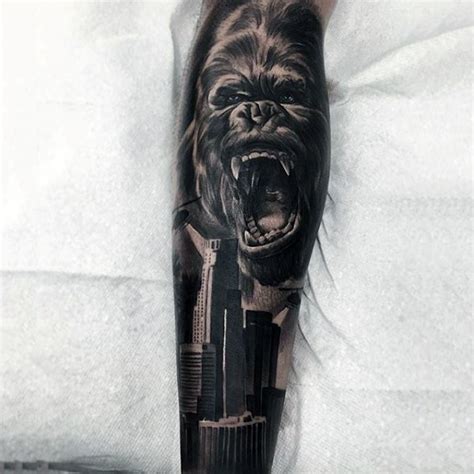 Brilliant detailed and colored angry Gorilla with city tattoo - Tattooimages.biz