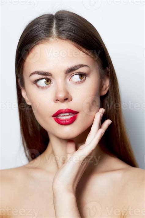 Brunette Natural Look Looks To The Side Red Lips And Bare Shoulders