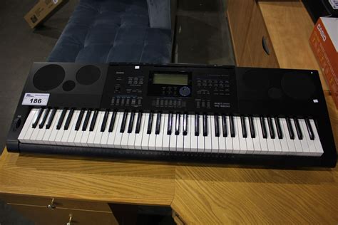 CASIO WK-6600 DIGITAL KEYBOARD - Able Auctions