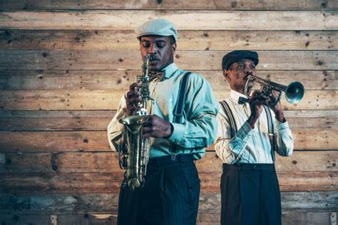 Two african american jazz musicians playing trumpet and saxophon Stock ...