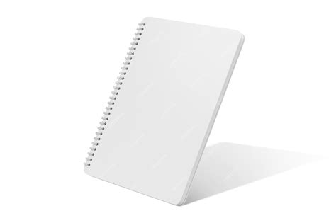 Premium Photo A White Spiral Notebook With A White Cover