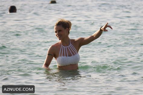 Michelle Hunziker Sexy White Bikini On The Beach In Dubai AZNude