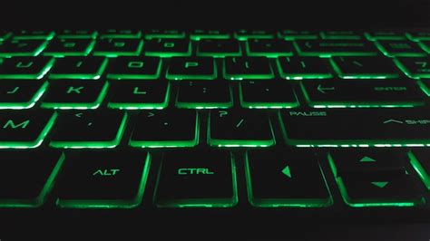 Premium Photo Qwerty Type Laptop Keyboard With Green Light