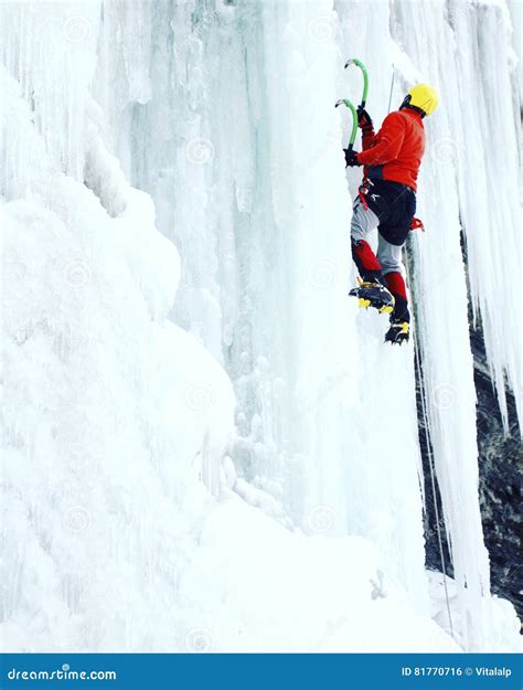 Man Climbing Frozen Waterfall Stock Photo Image Of Crampons Dangle