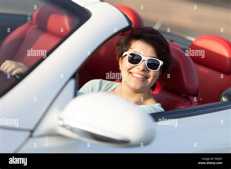 Woman Driving a Convertible Stock Photo - Alamy