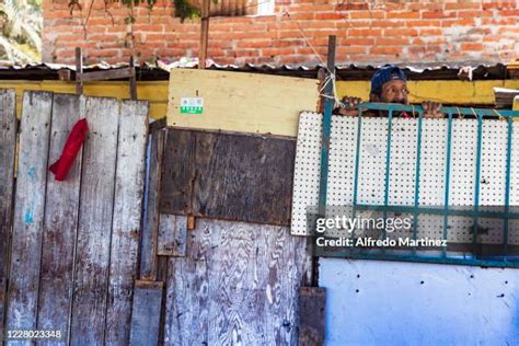 Man Peering Over Fence Photos And Premium High Res Pictures Getty Images