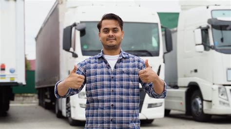 Trucks Driver With Trailer Carrying Cargo On Speed Intercity Highway