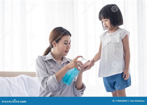 Mother Is Washing Daughterand X27s Hand Stock Image Image Of Medicine Home 178065803