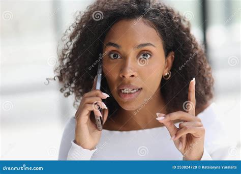 Portrait Of A Young Attractive African American Woman Talking On The