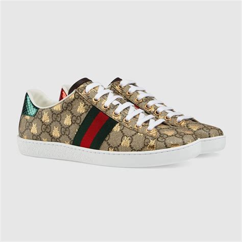 Discover the Women's Ace Sneaker GG Supreme Canvas With Gold Bees