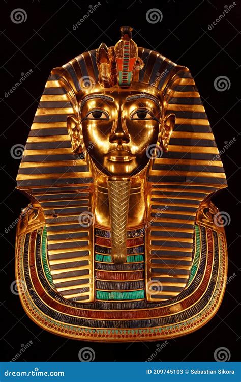 Funerary Burial Mask Of Egyptian Pharaoh Tutankhamun Isolated On Black