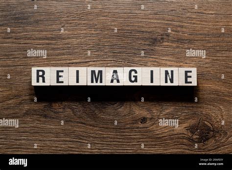 Reimagine Word Concept On Building Blocks Text Stock Photo Alamy