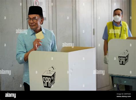 Malaysian Opposition Leader Anwar Ibrahim Shows His Ballot During The