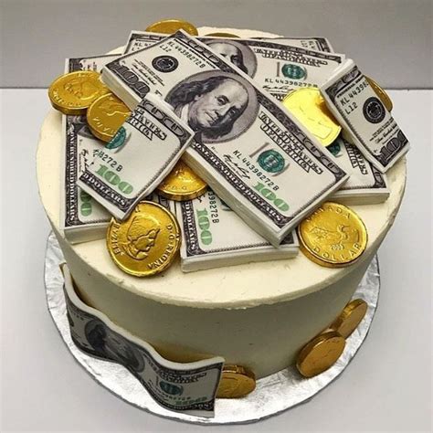 a cake decorated with money and gold coins