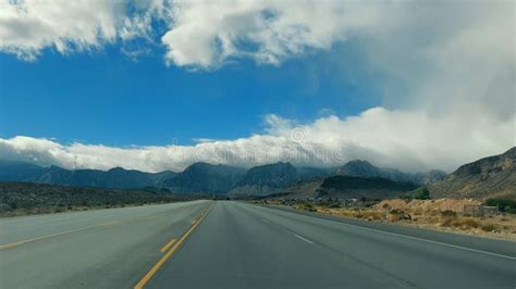 Open Highway In Desert Landscape A Quiet Highway Stretches Into The