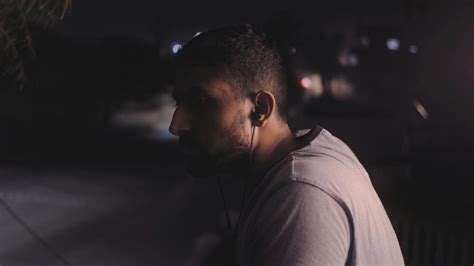cinematic shot   man sitting   dark  stock video