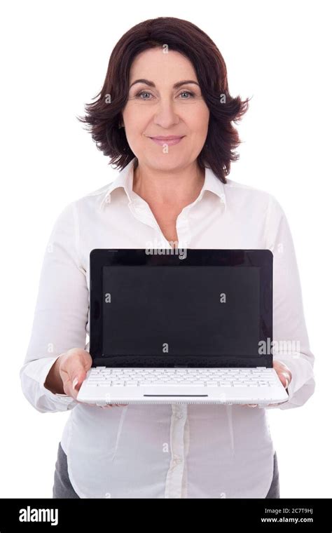 Portrait Of Beautiful Mature Business Woman Showing Laptop With Blank Screen Isolated On White