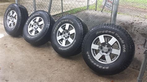 09 nissan frontier pro 4 x wheels and tires $350 | Nissan Frontier Forum