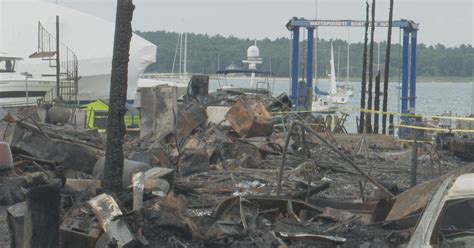 Crews face weeks of cleanup after huge Mattapoisett boat yard fire ...