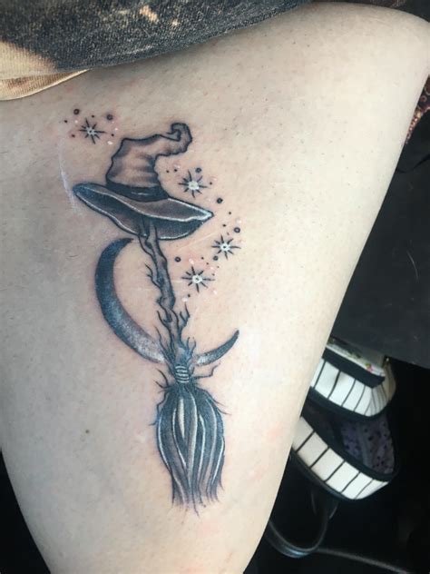 First tattoo! Witches broom stick with a crescent moon. Done by Jason ...