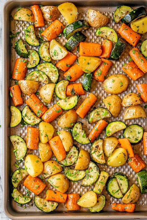 Garlic Herb Roasted Potatoes Carrots And Zucchini Vegetable Recipes Roasted Potatoes And