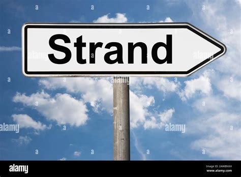 Detail Photo Of A Signpost With The Inscription Strand Beach Stock