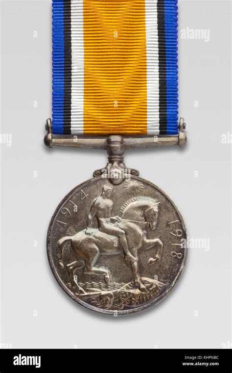 Reverse side of British War Medal on ribbon showing St George on ...