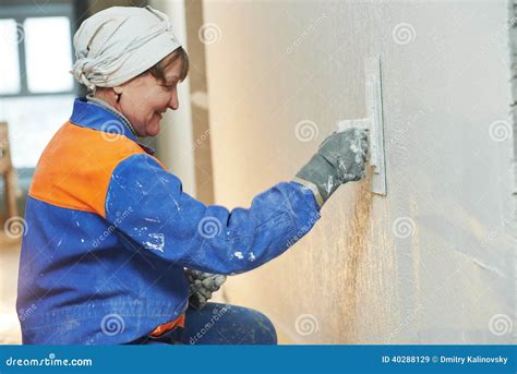 Plasterer at Indoor Wall Work Stock Image - Image of priming, repair ...