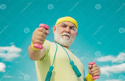 Old Mature Man Exercising With Dumbbell Healthy Lifestyle Concept