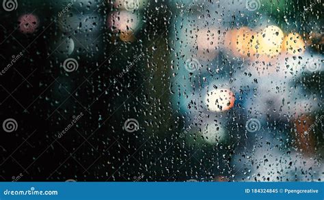 Window And Rain Drop In Condominium Or Apartment Room On A Rainy Day