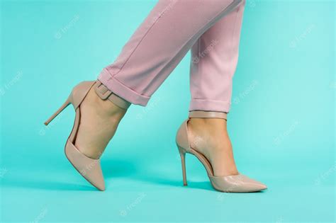 Premium Photo Sexy Legs In Brown High Heels Shoes On Blue Background