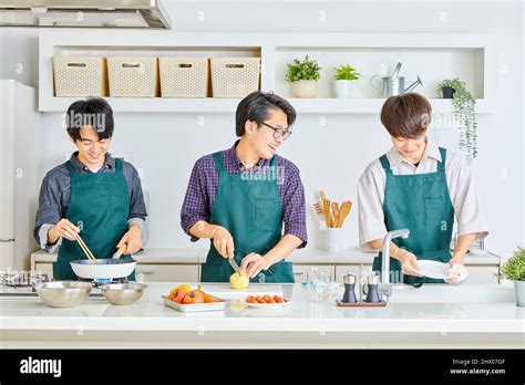 Japanese Men Cooking Stock Photo Alamy