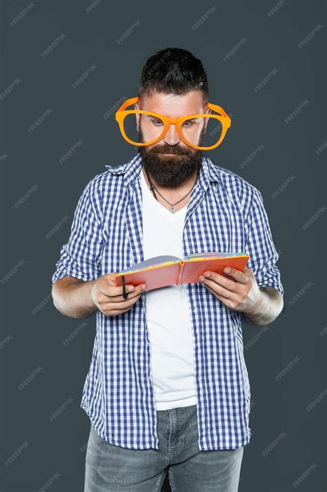 Premium Photo Funny Amazed Serious Man In Party Glasses Reading Book