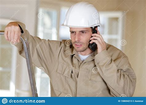 Architect Talking on Walkie- Talkie Stock Image - Image of handsome, engineer: 158694213