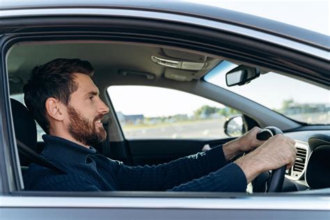 Man Driving Car Side View