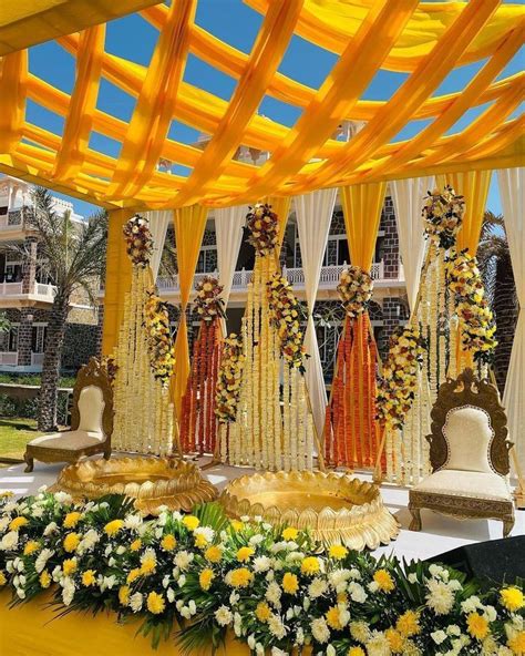 25 Latest Background Haldi Ceremony Decoration Ideas For 2024 Haldi Ceremony Decorations