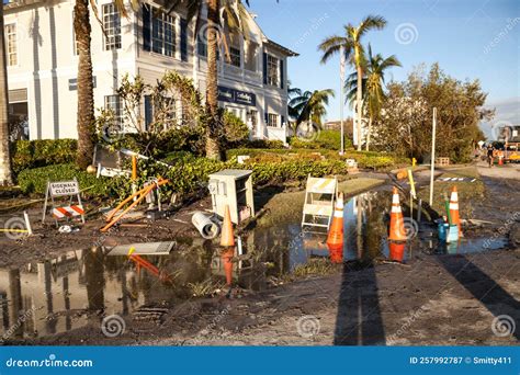 News â€“ Debris Including Personal Items Alongside Flooded Homes After