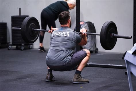 Team Wod 10 Rft Partner Runs Pull Ups Front Squats And Push Press