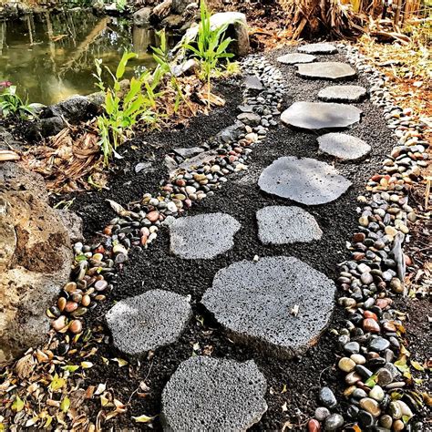 Build Natural Walkways With Our Puka Lava Pavers Along The Fish Pond