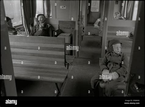 Travelers in a passenger car Stock Photo - Alamy