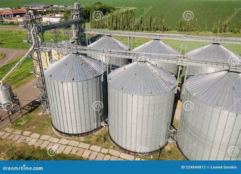 Metal Silos On Field Aerial View Large Containers For Storing And