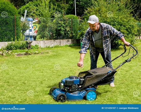 Middle Aged Man Is Moving The Lawn Stock Image Image Of Cares Work 121426187