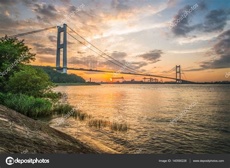 Jiangyin Yangtze Bridge at sunset Stock Photo by ©fanjianhua 140590226