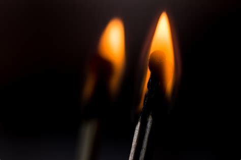 Premium Photo A Burning Wooden Matches Closeup