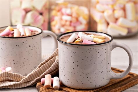 Premium Photo Hot Chocolate With Marshmallow In A Cup On Wooden Background