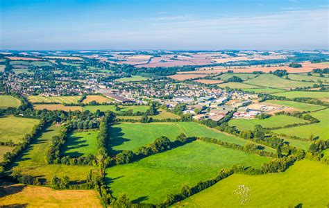 Aerial Photograph Over Country Village Green Summer Fields Rural