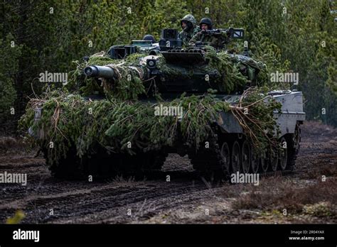 Finnish Soldiers Assigned To The Finnish Armoured Brigade Maneuver A