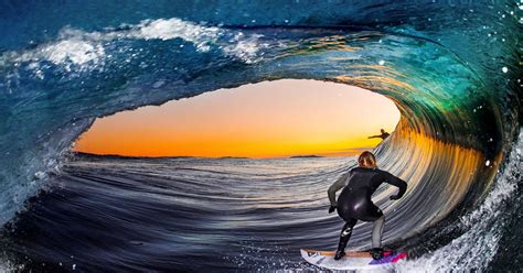 Stunning surfing pictures capture the thrill of gunning the barrel from ...